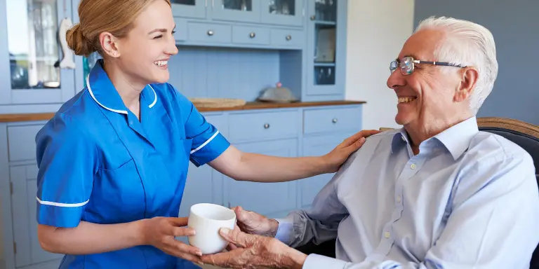 Nurse giving tea